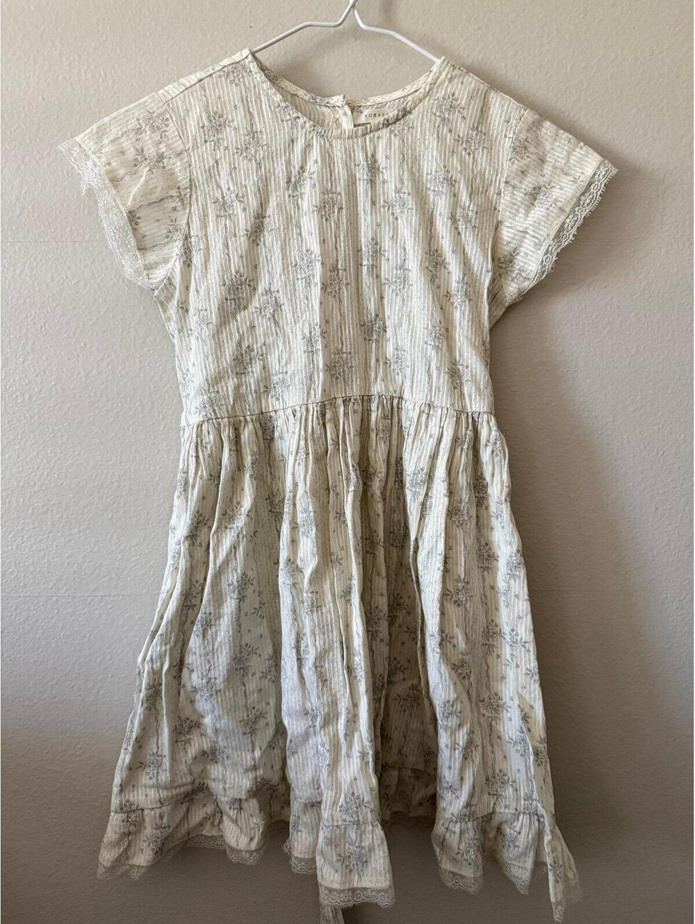 Noralee girls dress in a soft ivory tone with delicate gray floral print